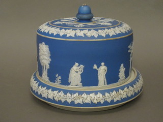 A circular blue and white Jasperware cheese dish and cover 8  1/2", the base chipped