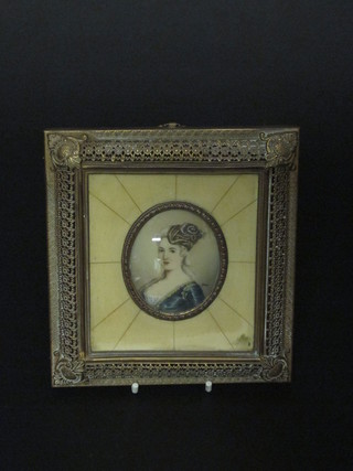 Silver, head and shoulders portrait miniature "Lady Wearing a  Blue Dress" contained in an ivory and gilt mounted frame, 3"  oval