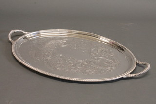 An oval silver plated and engraved tea tray by Mappin & Webb  20"