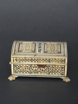 An Eastern trinket box, the domed lid with pierced ivory decoration, raised on hoof feet, 1 missing, 3 1/2"