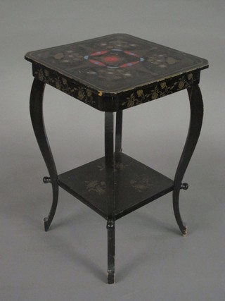 A black lacquered 2 tier occasional table, raised on cabriole  supports 11"