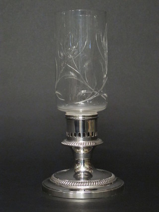 A silver plated table candle holder complete with etched glass  shade