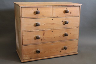 A 19th Century pine chest of 2 short and 3 long drawers with  tore handles 42"