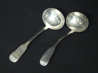 A George III Irish silver fiddle and rat tail pattern sauce ladle,  1800 and 1 other Irish silver fiddle pattern sauce ladle, 2 ozs