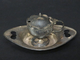 An Edwardian silver mustard pot with hinged lid Birmingham  1910 together with a silver twin handled dish, Sheffield 1906 3  1/2 ozs