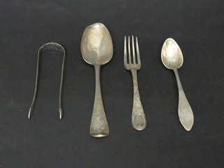 An antique silver Old English pattern bottom marked spoon, a Victorian engraved silver christening fork, a Continental silver  teaspoon and a pair of bright cut sugar tongs 4 ozs