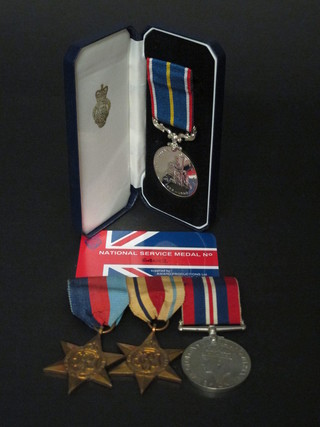 A group of 3 medals comprising 1939-45 Star, Africa Star and  British War medal, together with a National Service medal, cased