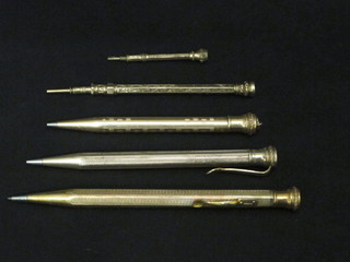 5 gilt metal cased propelling pencils