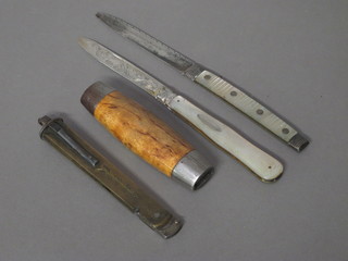 A folding knife with steel blade and wooden handle by John  Engstrom Sweden together with 2 folding fruit knives with silver  blades and mother of pearl grips