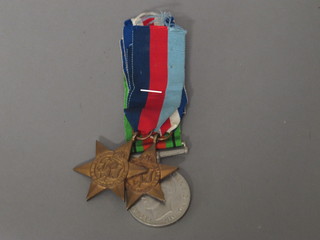 A group of 3 medals comprising 1939-45 Star, France &  Germany Star and Defence medal