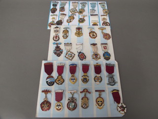34 various gilt metal and enamelled Masonic charity jewels
