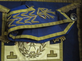 A quantity of Masonic regalia comprising a silver gilt Grand Officer's collar jewel, collar, full dress apron, undress apron -  Grand Standard Bearer