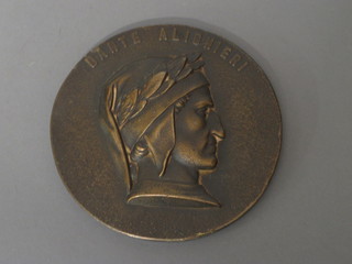 A circular bronze plaque marked Danti Alighieri