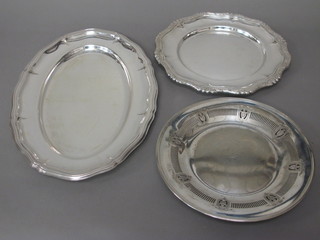 An oval silver plated meat platter with bracketed border 16", a circular dish with bracketed border 11" and a pierced circular  silver plated dish