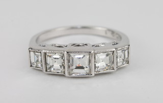 A lady's 18ct white gold dress/engagement ring set 5 square cut diamonds, approx 1.60ct