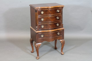 A Georgian style serpentine fronted mahogany chest of 4 long drawers with crossbanded top, raised on cabriole supports 18"