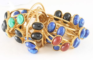 A collection of gilt metal dress rings