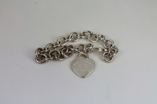 A silver bracelet marked Tiffany