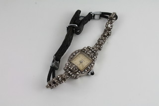 A lady's Vesta cocktail wristwatch contained in a marcasite case