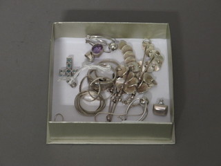A silver bracelet, 3 silver rings and various silver costume jewellery