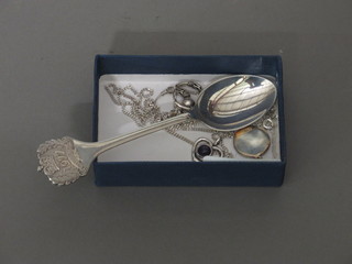 A silver spoon to commemorate the Queens 1977 Silver Jubilee,  a silver St Christopher and other silver jewellery