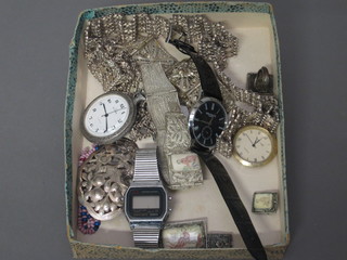 A collection of filigree costume jewellery and a small collection  of wristwatches