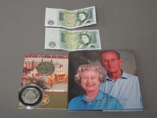 A 2007 ?5 coin, a 2002 Golden Jubilee commemorative medal, a 2007 Diamond Wedding medal and two ?1 notes