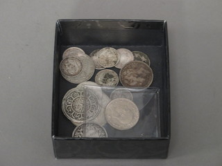 A George V 1928 shilling and a collection of other silver coins