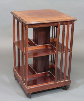 A square Edwardian mahogany 2 tier revolving bookcase 10"