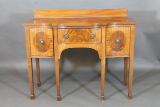 An Edwardian Georgian style mahogany sideboard with raised  back fitted 1 long drawer flanked by cupboards, raised on square  tapering supports ending in spade feet 45"