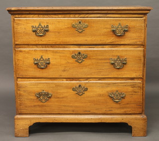 A Georgian oak chest of 3 long drawers, raised on bracket feet  38"  ILLUSTRATED