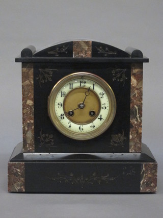 A Victorian 8 day striking mantel clock with enamelled dial and Arabic numerals contained in a 2 tone marble case