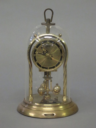 A 400 day clock with enamelled dial and glass dome