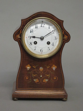 A French 8 day striking mantel clock with enamelled dial and Roman numerals contained in an inlaid mahogany case 6 1/2"   ILLUSTRATED