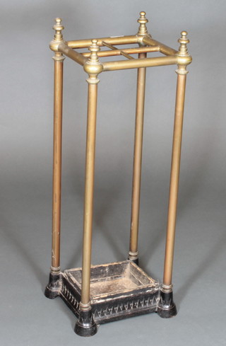 A square brass and iron umbrella stand