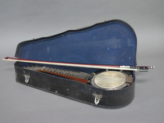 An 8 stringed Banjo with 7" drum, together with a violin bow