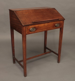 A Georgian mahogany clerk's bureau with fall front and well  fitted interior, raised on square tapering supports with H framed  stretcher 28"