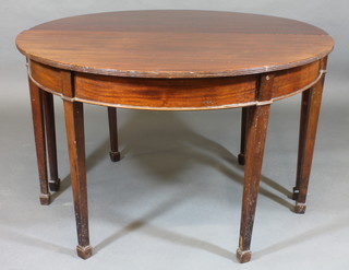 A Georgian mahogany D end table, raised on 6 supports ending  in spade feet 46"