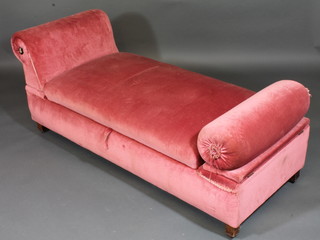 A Scad-Way box ottoman upholstered in pink material 62"