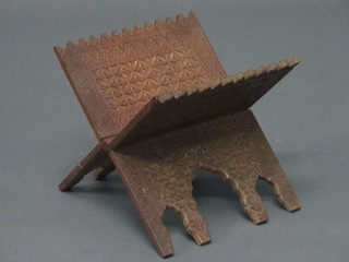 A carved Eastern hardwood folding Koran stand 11"