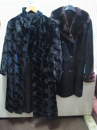 A black fur coat and a brown simulated fur coat