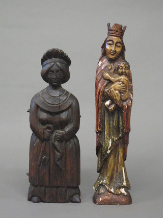 A carved wooden trinket box in the form of standing lady 14"  and a carved wooden figure of Madonna and child 7"