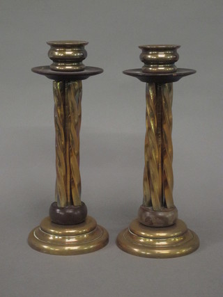 A handsome pair of brass and Bakelite candlesticks 10"