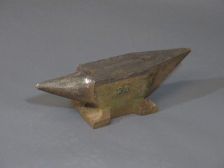 An iron anvil marked 20, 17"