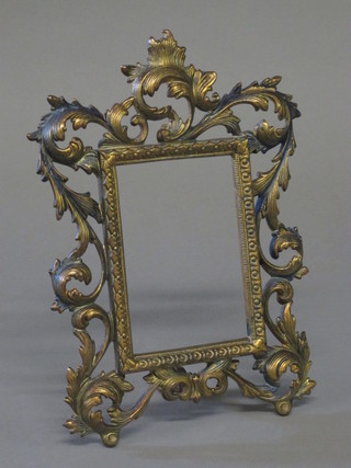 A pierced gilt metal easel frame 11"
