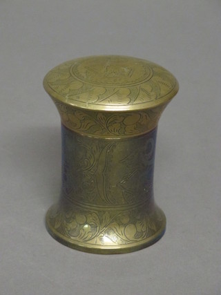 An Eastern engraved brass waisted jar and cover 4"