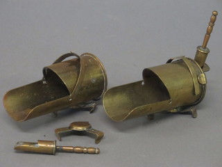A pair of Trench Art sugar scuttles formed from shells