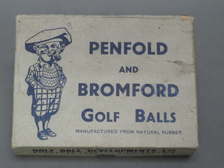 A cardboard box for Penfold & Broomfields golf balls
