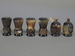 A 6 piece carved horn condiment set comprising pair of mustard  pots, pair of salts, pair of peppers
