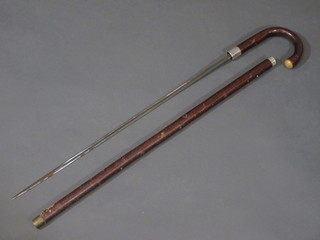 A Victorian sword stick by Wilkinson Sword with etched blade  and retailed by Swaine & Brigg